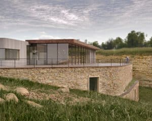 Side elevation of Greystone, a Para 80, energy efficient passive house. Designed by Hawkes Architecture, inspired by the locally quarried Cotswold Stone.