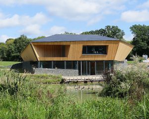 View from the lake at Brooks Barn a Para 80, energy efficient passive house. Another grand design by Hawkes Architecture.