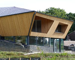 Side elevation at Brooks Barn a Para 80, energy efficient passive house. Another grand design by Hawkes Architecture.