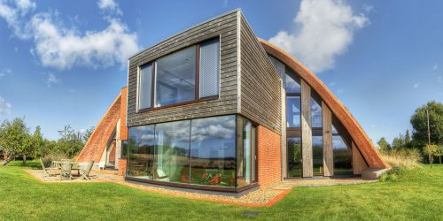 Garden View of Crossway, a Para 80 (PPS 7), energy efficient Passivhaus. Designed by Hawkes Architecture and featured on Channel 4's Grand Designs.