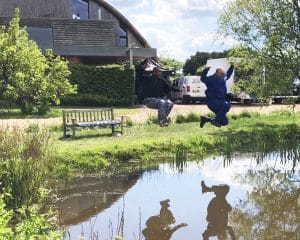 Actor Greg Davies and co-star Layton Williams filming at Crossway, a Para 80 (PPS 7), energy efficient Passivhaus. Designed by Hawkes Architecture and featured on Channel 4's Grand Designs.