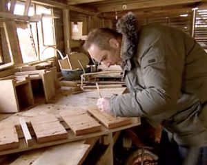 Kevin McCloud signing a Kent Peg Tile to go on the parabolic arch at Crossway, a Para 80 (PPS 7), energy efficient Passivhaus. Designed by Hawkes Architecture and featured on Channel 4's Grand Designs.