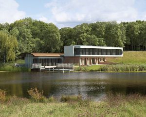 View across the lake at Lake House a Para 80, energy efficient passive house. Another grand design by Hawkes Architecture.