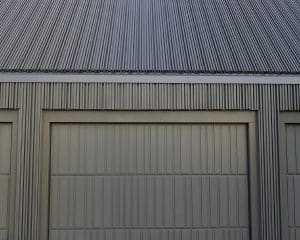 Aluminium cladding with mitred fluted ridge, used on the garage at Viewpoint, a Para 80 (Para 55), energy efficient passive house. Another grand design by Hawkes Architecture.