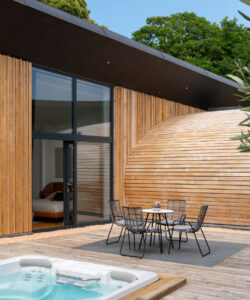 Courtyard leading into the master bedroom at Bigbury Hollow, a Para 80 (PPS 7), energy efficient, passive house. Designed by Hawkes Architecture and featured on Channel 4's Grand Designs.