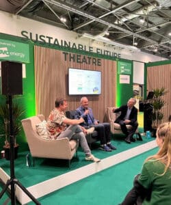 Richard Hawkes of Hawkes Architecture on the stage talking to Kevin McCloud about sustainable living at Grand Designs Live.